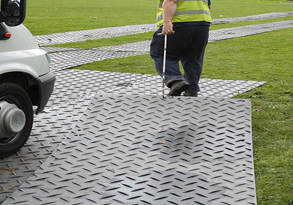 What is the use of temporary road mats?