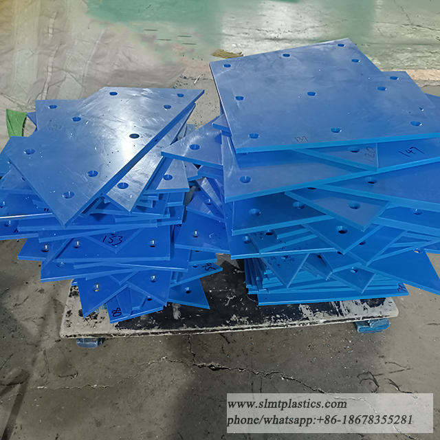 DRIVE END DISCHARGE CHUTE FOR REVERSIBLE SHUTTLE CONVEYORSUHMW TIVAE LINER PLATE 12.7 Thk